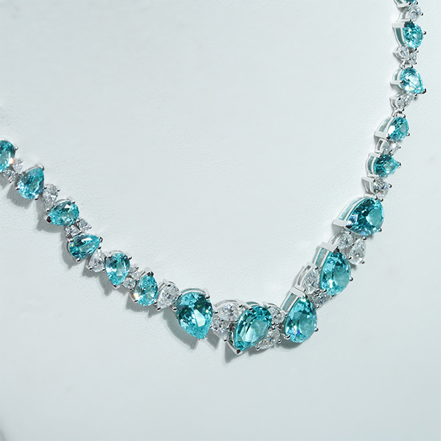 14K White Gold Pear Cut Lab Grown Paraiba Sapphire at Moissanite Luxury Diamond Necklace